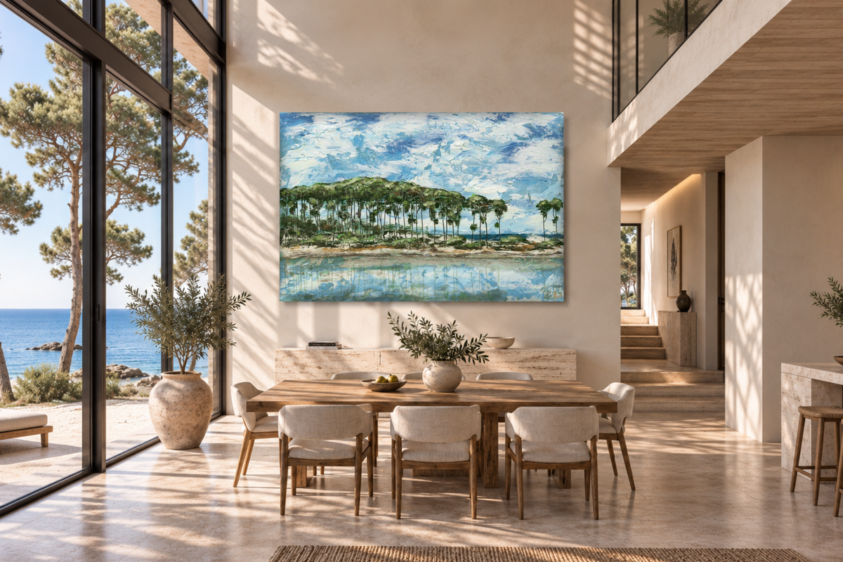 A large canvas art print depicting Western Lake on 30A, with slash pines and a blue sky, displayed on a beige wall in a modern, sunlit dining room with a wooden dining table and chairs.
